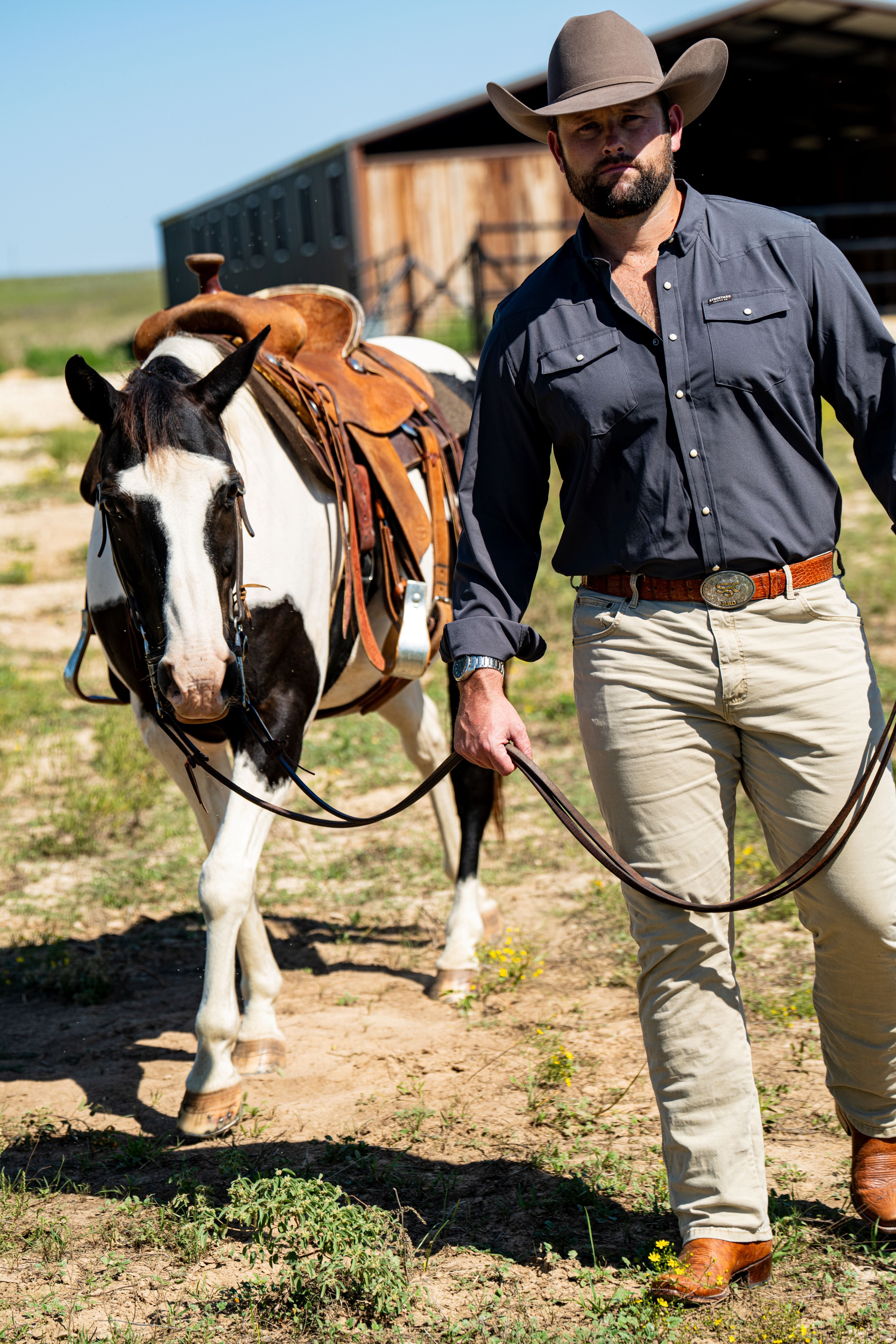 A single green leaf against a white background.