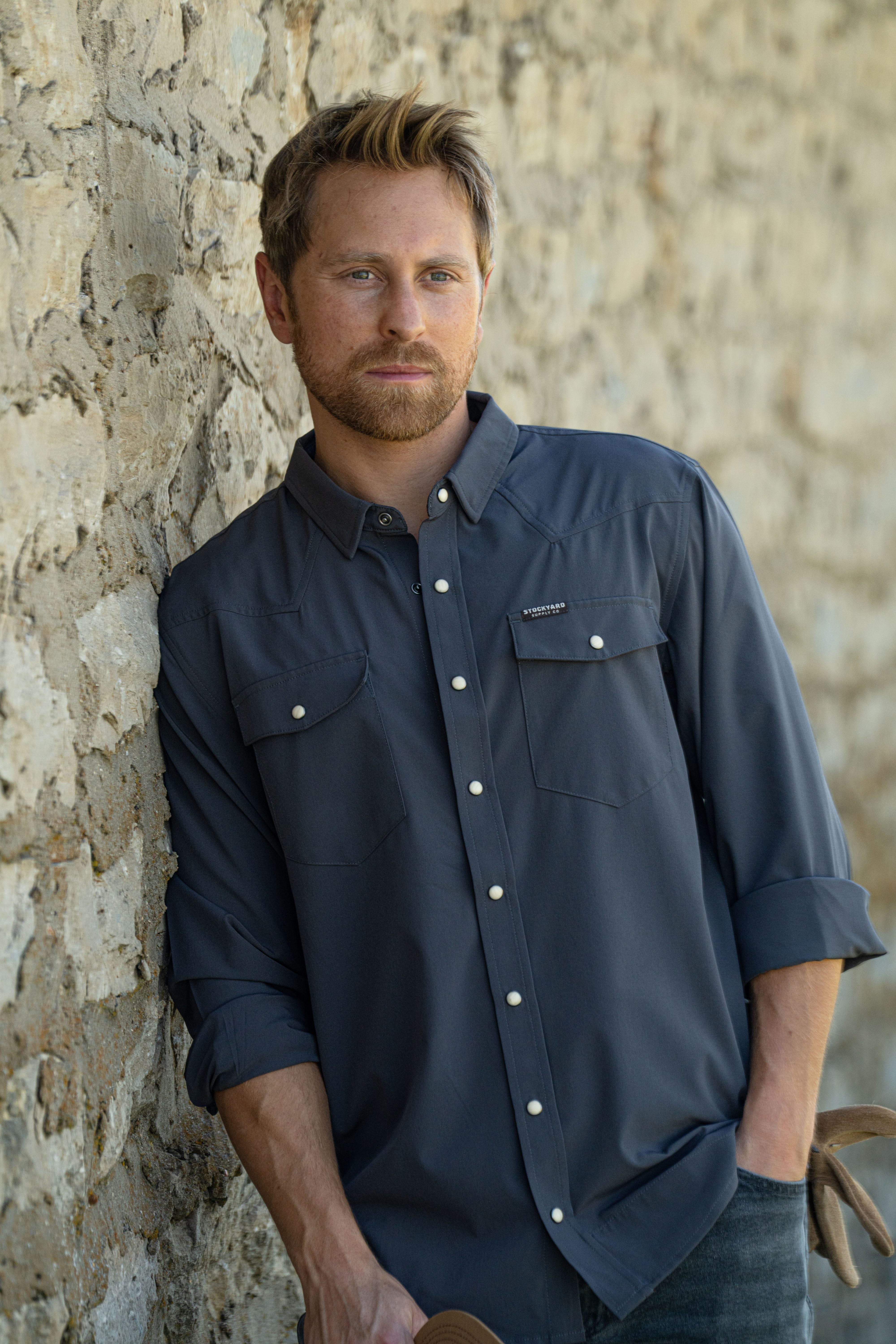 A single green leaf against a white background.
