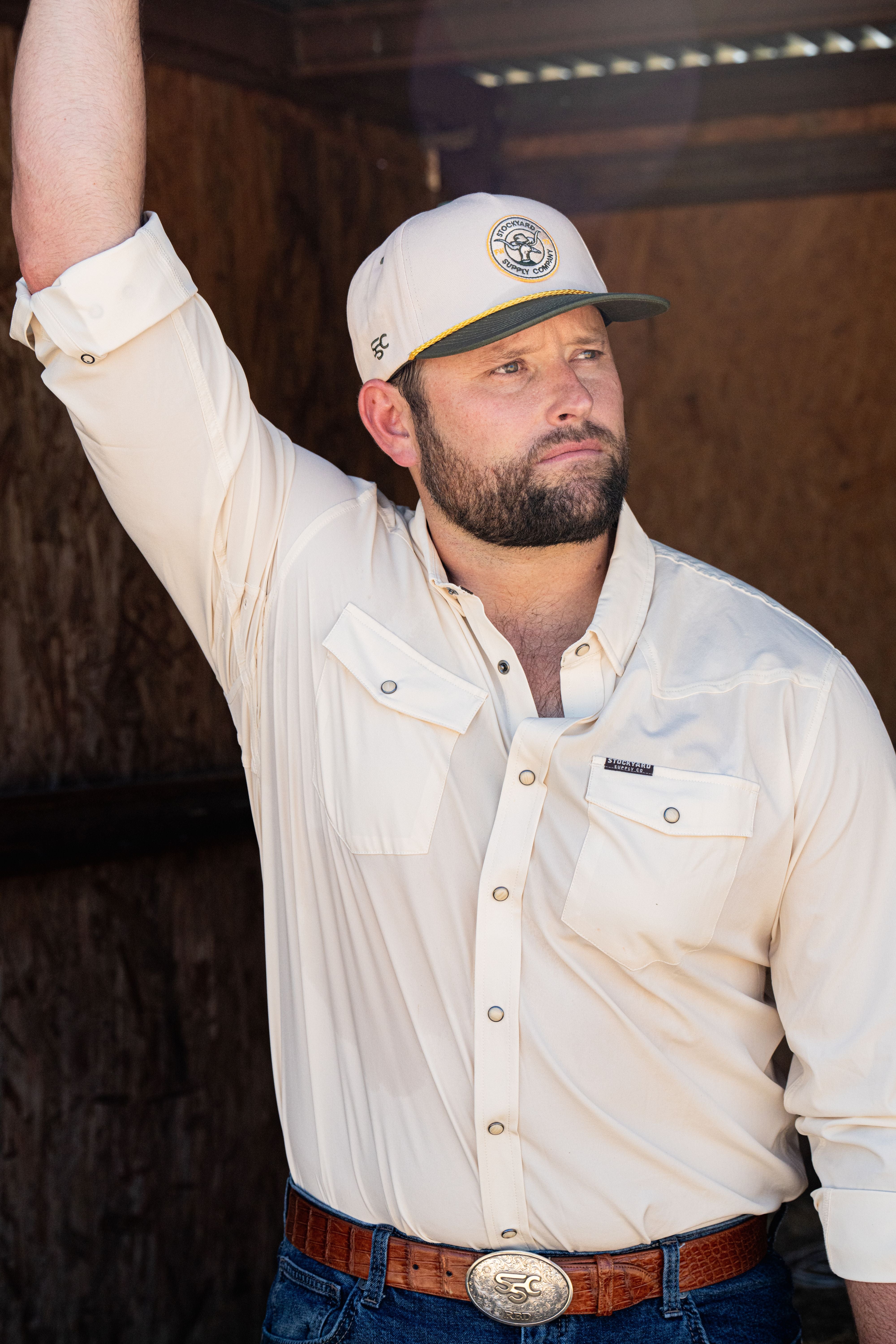 A single green leaf against a white background.