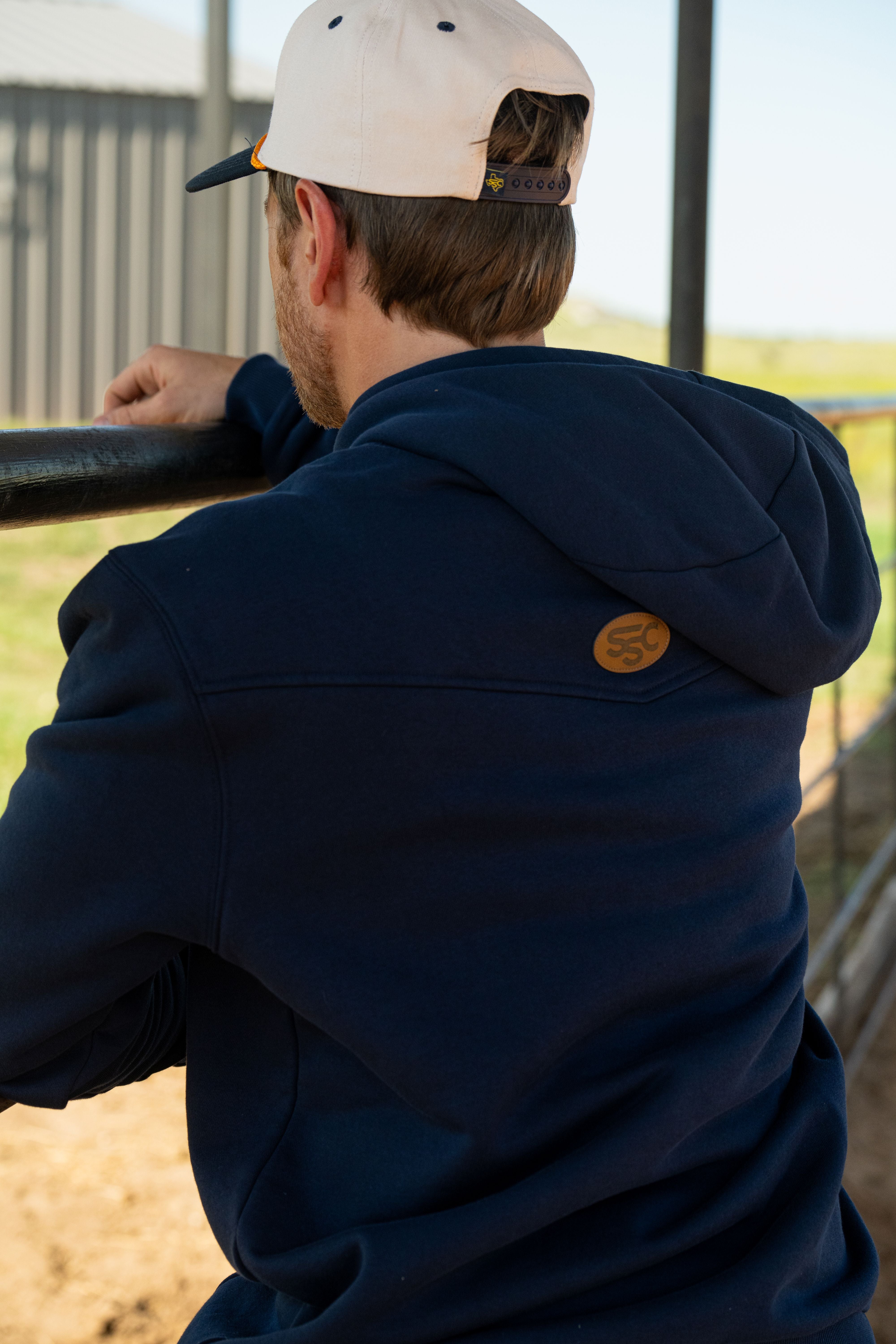 A single green leaf against a white background.
