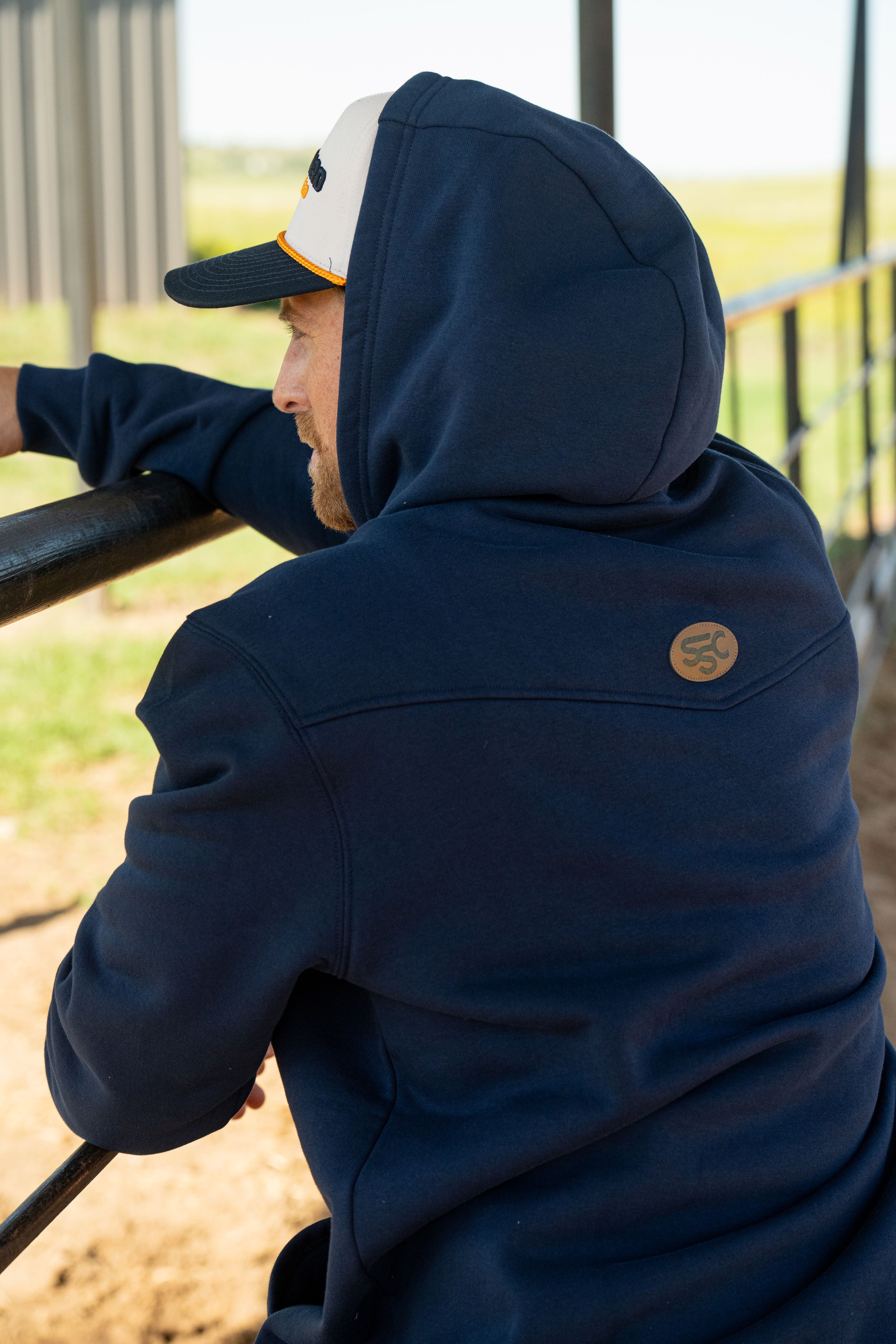 A single green leaf against a white background.