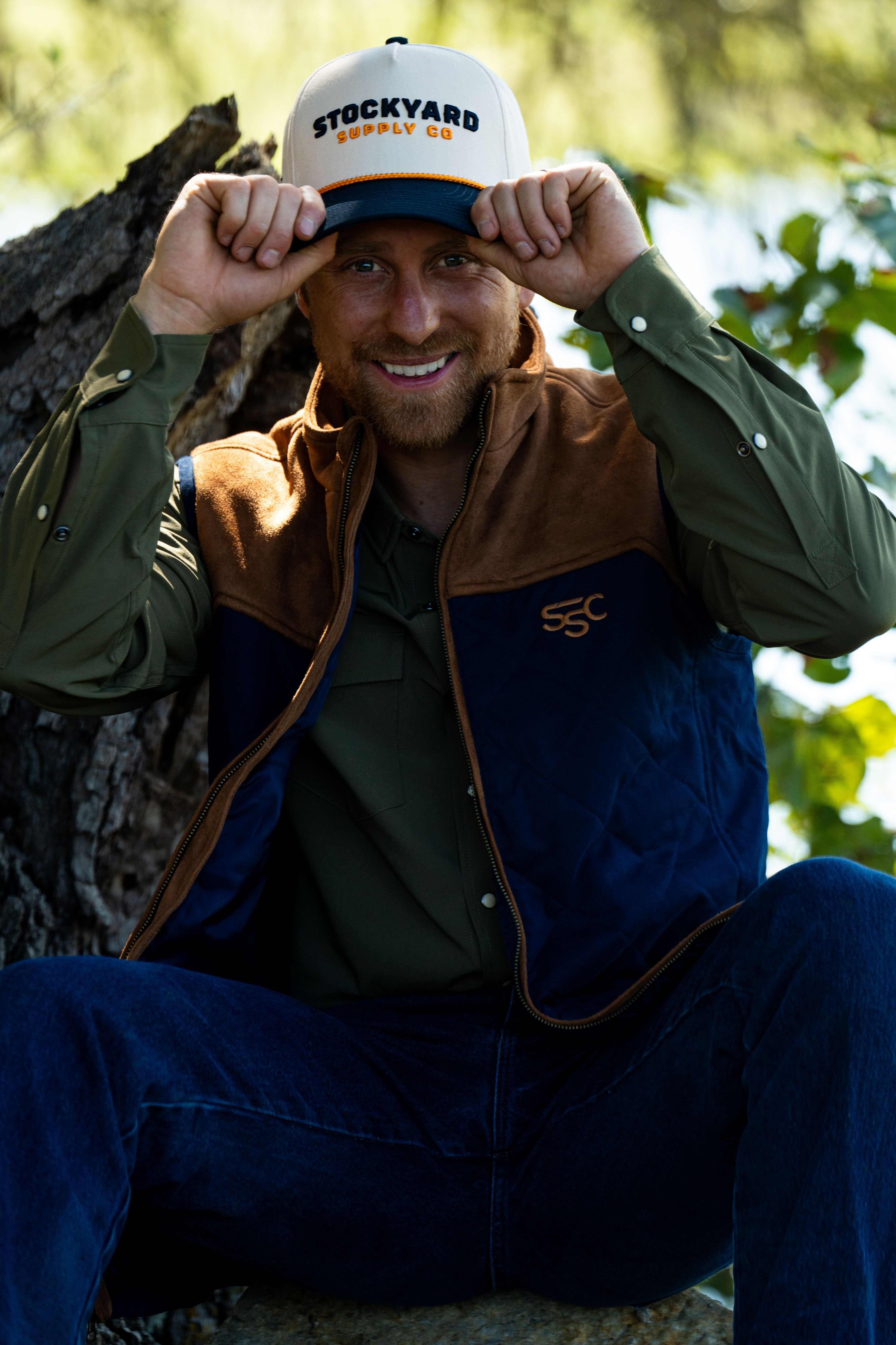 A single green leaf against a white background.